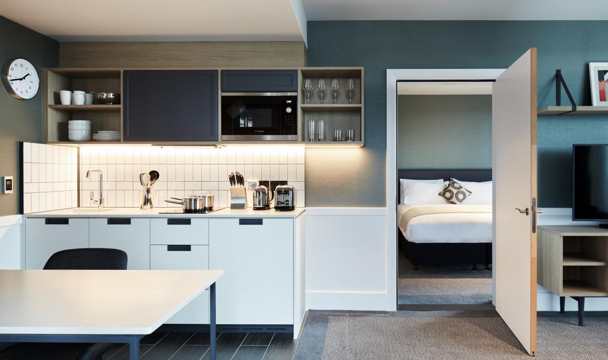 Hyatt-House-Manchester-Suite-Kitchenette-and-Bedroom